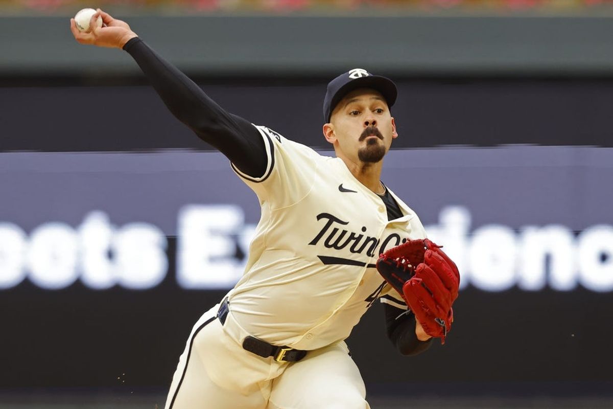 Jun 12, 2024; Minneapolis, Minnesota, USA; Minnesota Twins starting pitcher Pablo Lopez (49) throws to the Colorado Rockies in the first inning at Target Field. Mandatory Credit: Bruce Kluckhohn-USA TODAY Sports