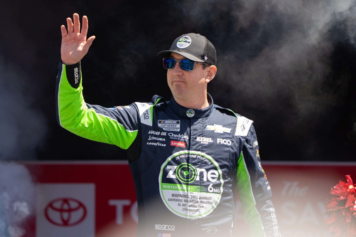 Jun 9, 2024; Sonoma, California, USA;  NASCAR Cup Series driver Kyle Busch (8) waves as he gets introduced to fans before the start of the Toyota / Save Mart 350 at Sonoma Raceway. Mandatory Credit: Stan Szeto-Imagn Images