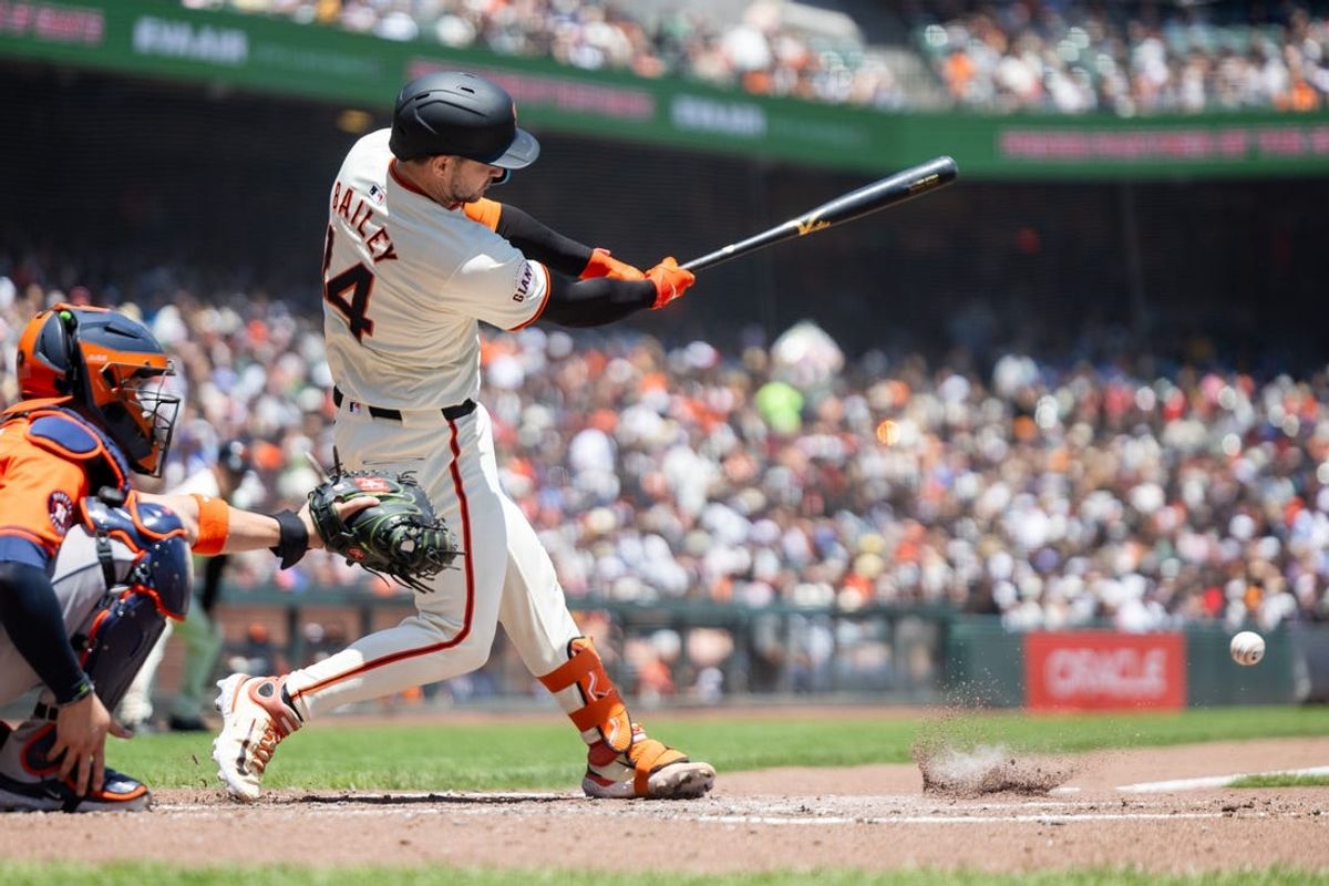 Jun 12, 2024; San Francisco, California, USA;  San Francisco Giants catcher Patrick Bailey (14) grounds out to end the inning during the third inning against the Houston Astros at Oracle Park. Mandatory Credit: Bob Kupbens-USA TODAY Sports