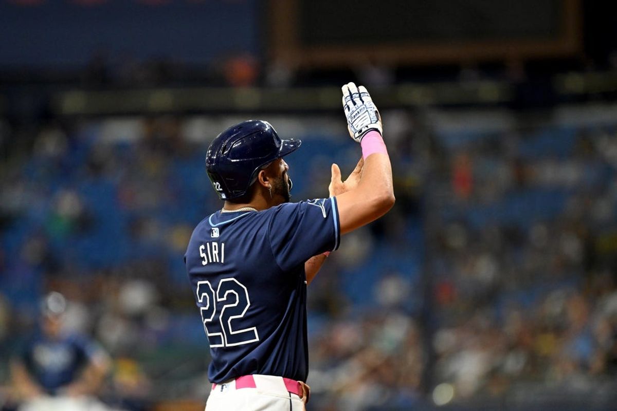 Jun 12, 2024; St. Petersburg, Florida, USA; Tampa Bay Rays center fielder Jose Siri (22) celebrates after hitting a solo home run in the fourth inning against the Chicago Cubs at Tropicana Field. Mandatory Credit: Jonathan Dyer-USA TODAY Sports