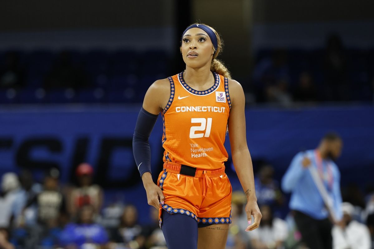 Jun 12, 2024; Chicago, Illinois, USA; Connecticut Sun guard DiJonai Carrington (21) looks on during the first half of a basketball game against the Chicago Sky at Wintrust Arena. Mandatory Credit: Kamil Krzaczynski-USA TODAY Sports