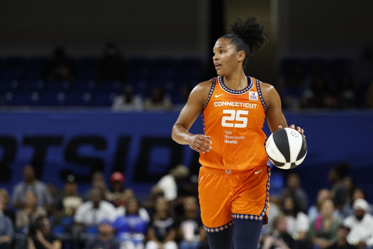 Jun 12, 2024; Chicago, Illinois, USA; Connecticut Sun forward Alyssa Thomas (25) brings the ball up court against the Chicago Sky during the first half of a basketball game at Wintrust Arena. Mandatory Credit: Kamil Krzaczynski-Imagn Images