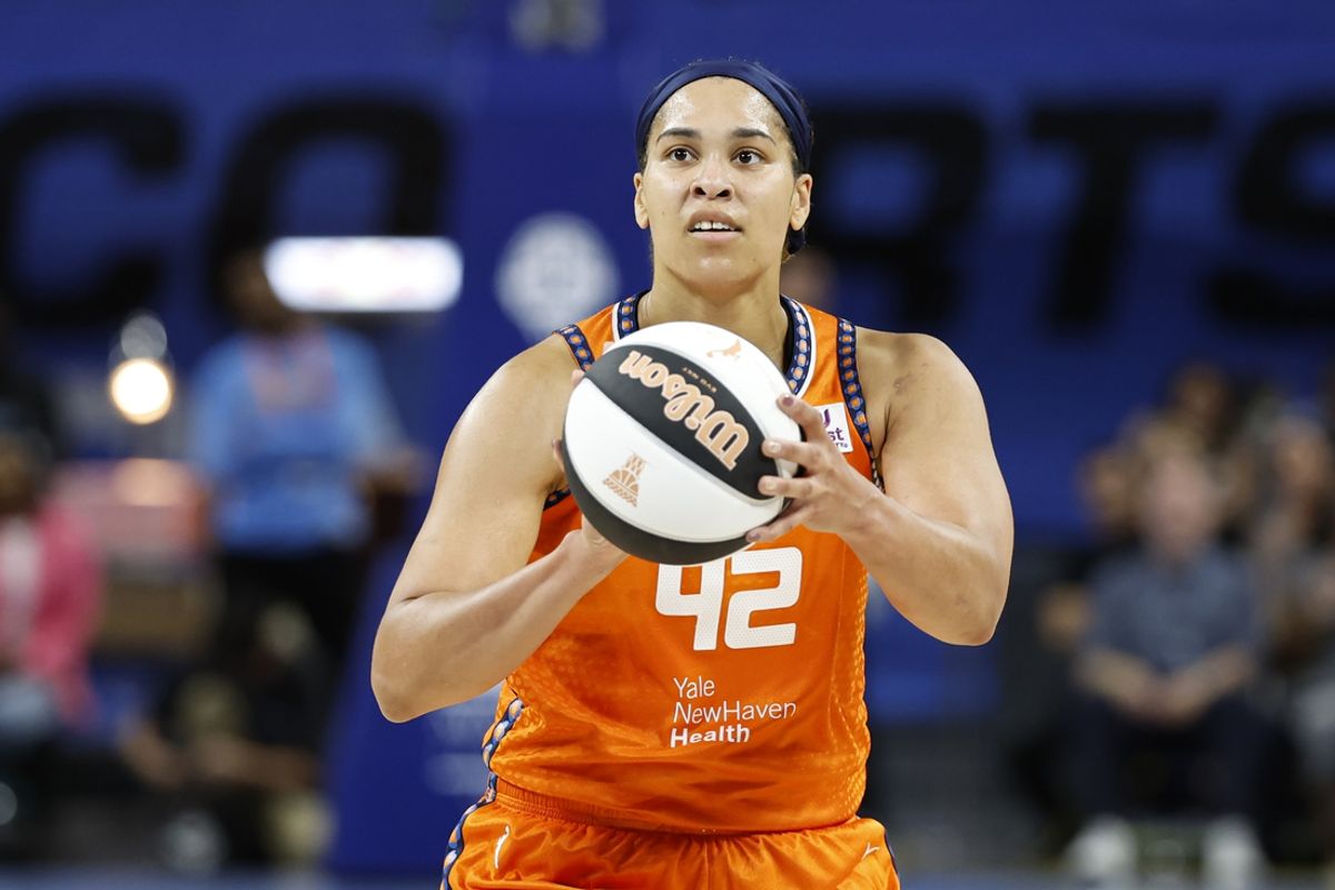 Jun 12, 2024; Chicago, Illinois, USA; Connecticut Sun forward Brionna Jones (42) shoots a free throw against the Chicago Sky during the first half of a basketball game at Wintrust Arena. Mandatory Credit: Kamil Krzaczynski-USA TODAY Sports