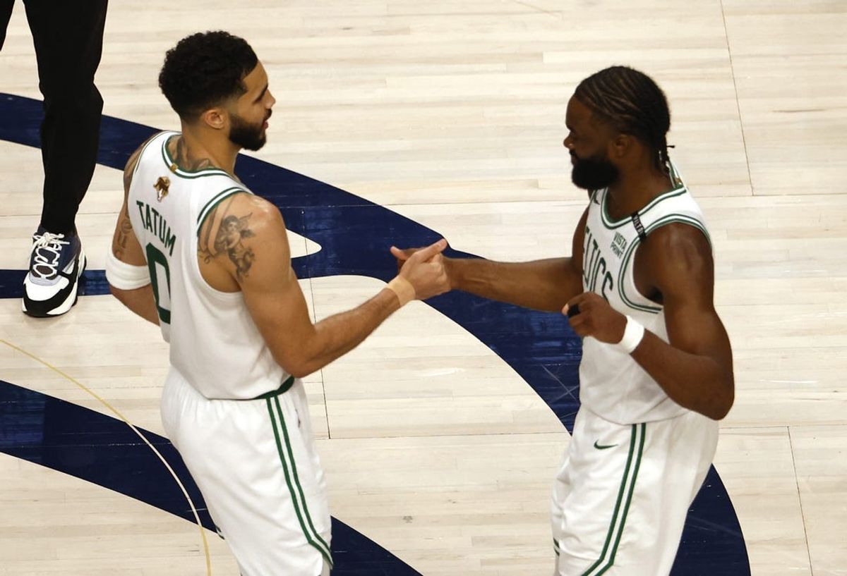 Jun 12, 2024; Dallas, Texas, USA; Boston Celtics forward Jayson Tatum (0) and guard Jaylen Brown (7) celebrate after defeating the Dallas Mavericks in game three of the 2024 NBA Finals at American Airlines Center. Mandatory Credit: Peter Casey-USA TODAY Sports