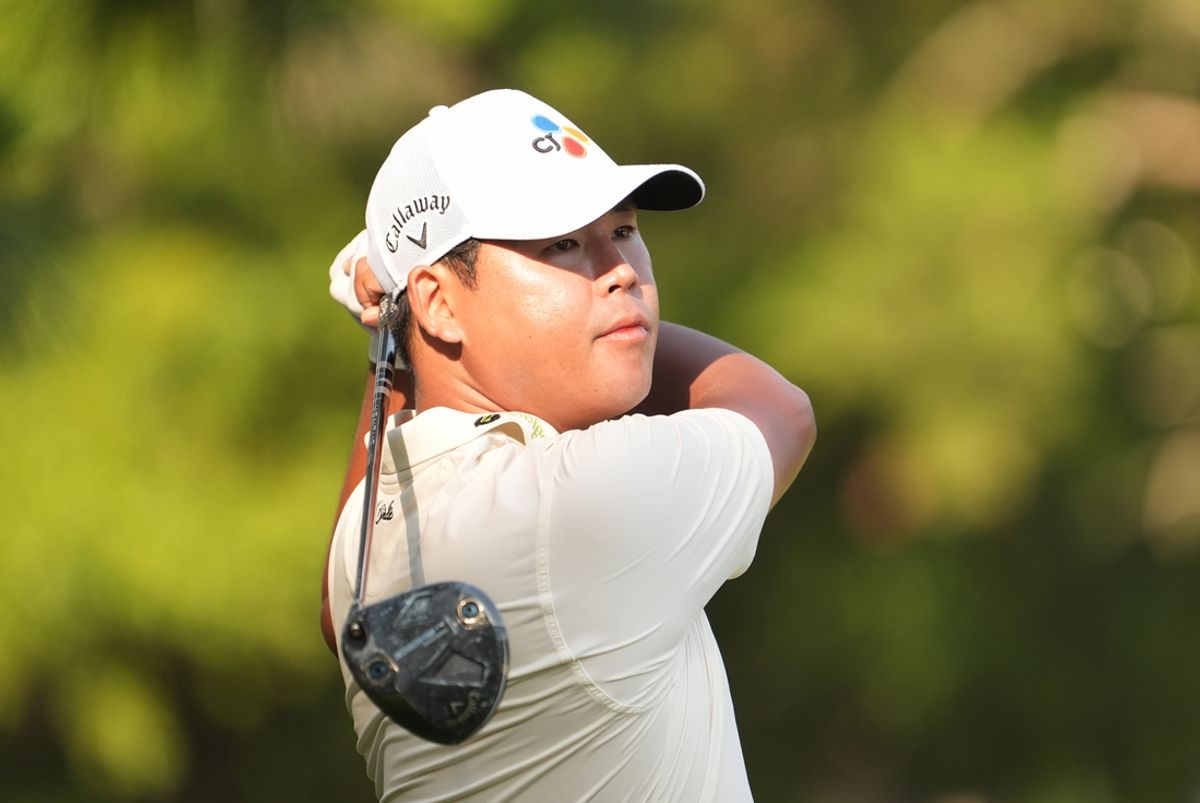 Jun 13, 2024; Pinehurst, North Carolina, USA; Si Woo Kim plays his shot from the second tee box during the first round of the U.S. Open golf tournament. Mandatory Credit: John David Mercer-USA TODAY Sports
