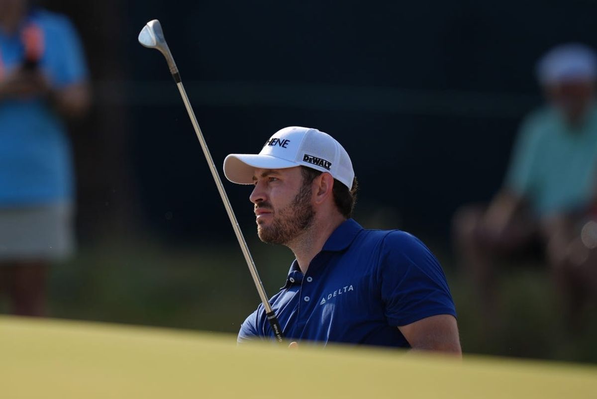 Jun 13, 2024; Pinehurst, North Carolina, USA;  Patrick Cantlay hits from the bunker onto the eleventh green during the first round of the U.S. Open golf tournament. Mandatory Credit: Jim Dedmon-USA TODAY Sports