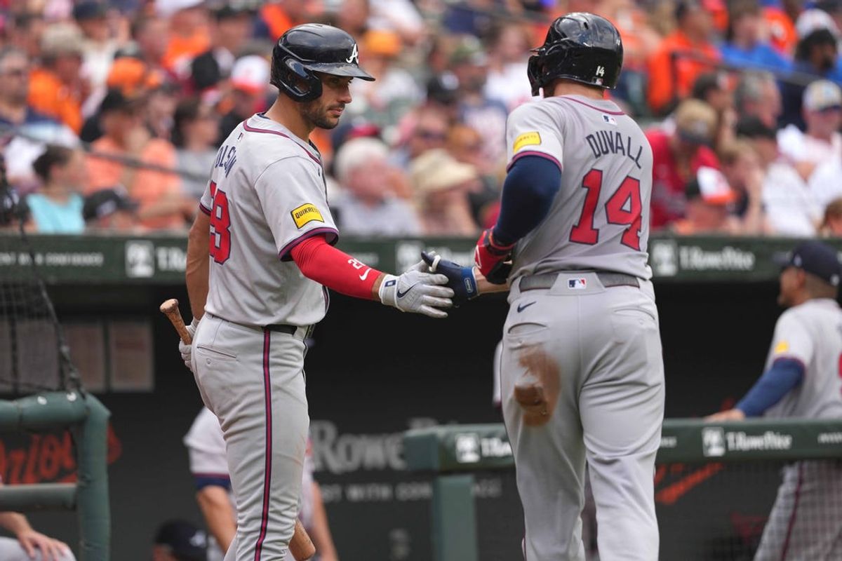 Jun 13, 2024; Baltimore, Maryland, USA; Atlanta Braves outfielder Adam Duvall (14) greeted by first baseman Matt Olson (28) after scoring in the fourth inning against the Baltimore Orioles at Oriole Park at Camden Yards. Mandatory Credit: Mitch Stringer-USA TODAY Sports
