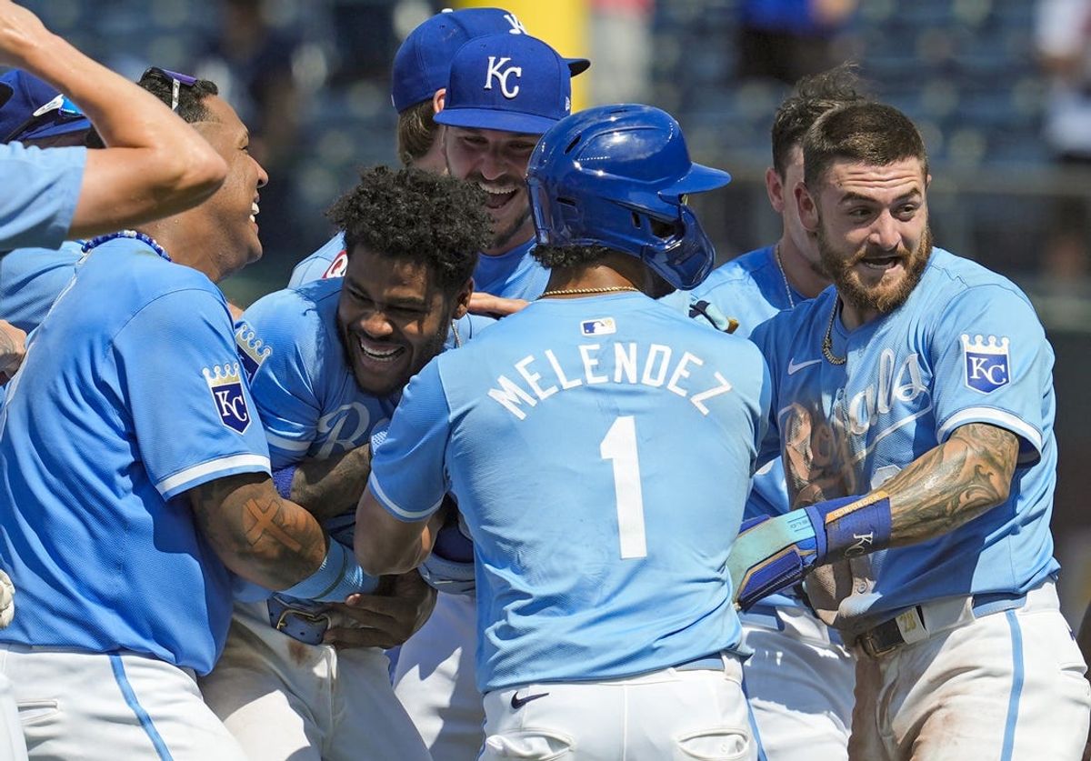 Jun 13, 2024; Kansas City, Missouri, USA; Kansas City Royals third baseman Maikel Garcia (11) celebrates with teammates after defeating the New York Yankees at Kauffman Stadium. Mandatory Credit: Jay Biggerstaff-USA TODAY Sports