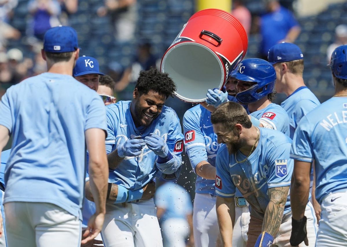 Jun 13, 2024; Kansas City, Missouri, USA; Kansas City Royals third baseman Maikel Garcia (11) celebrates with teammates after defeating the New York Yankees at Kauffman Stadium. Mandatory Credit: Jay Biggerstaff-USA TODAY Sports