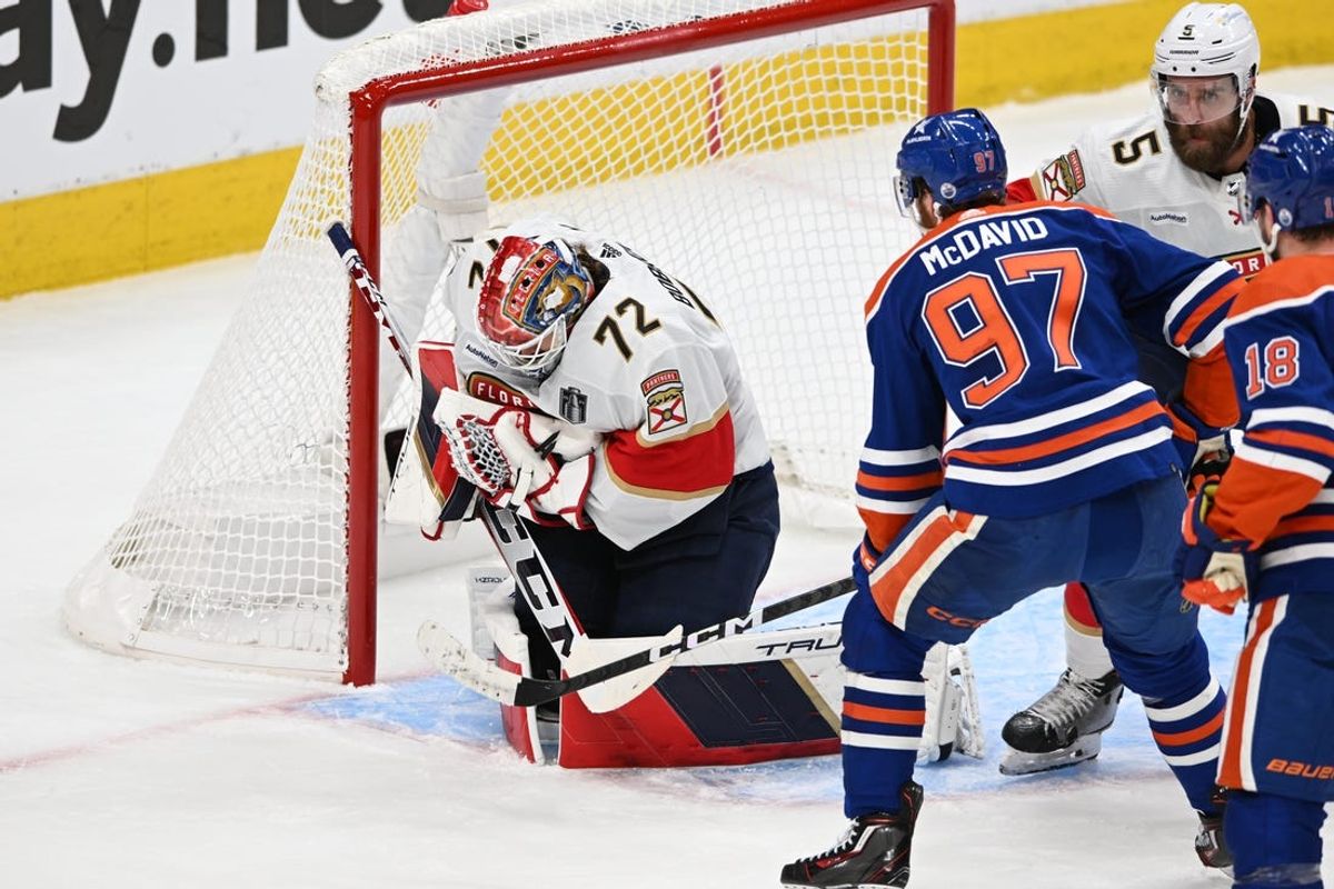 Jun 13, 2024; Edmonton, Alberta, CAN; Florida Panthers goaltender Sergei Bobrovsky (72) makes save in front of Edmonton Oilers center Connor McDavid (97) in the first period in game three of the 2024 Stanley Cup Final at Rogers Place. Mandatory Credit: Walter Tychnowicz-USA TODAY Sports