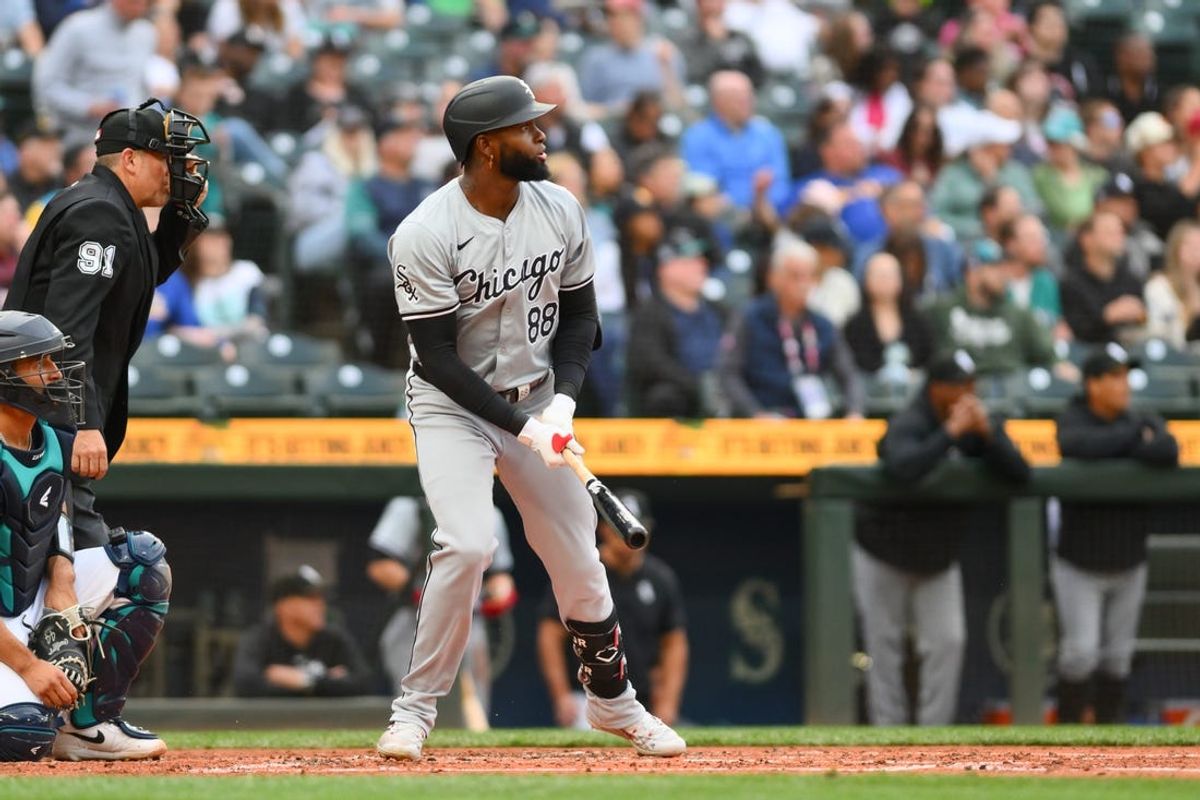 Jun 13, 2024; Seattle, Washington, USA; Chicago White Sox center fielder Luis Robert Jr. (88) hits a home run against the Seattle Mariners during the third inning at T-Mobile Park. Mandatory Credit: Steven Bisig-USA TODAY Sports