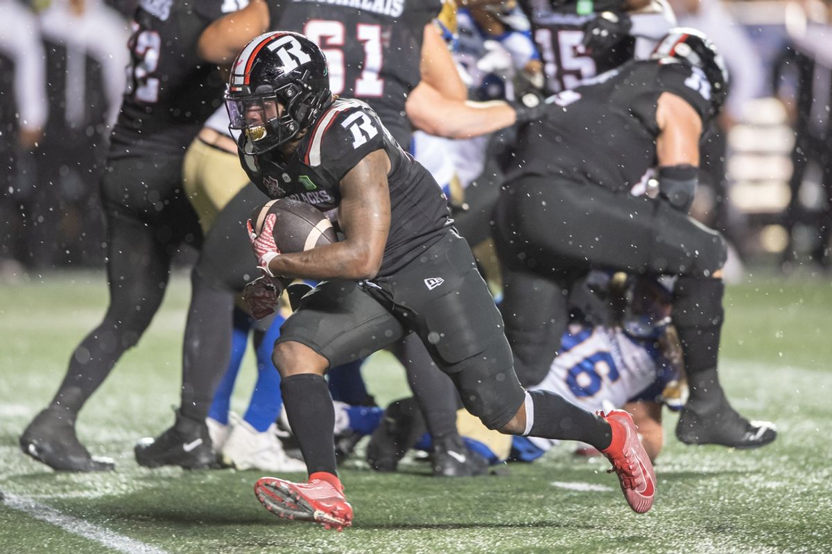 Jun 13, 2024; Ottawa, Ontario, CAN; Ottawa REDBLACKS running back Ryquell Armtead (25) runs the ball after a handoff in the second half against the Winnipeg Blue Bombers at TD Place. Mandatory Credit: Marc DesRosiers-Imagn Images