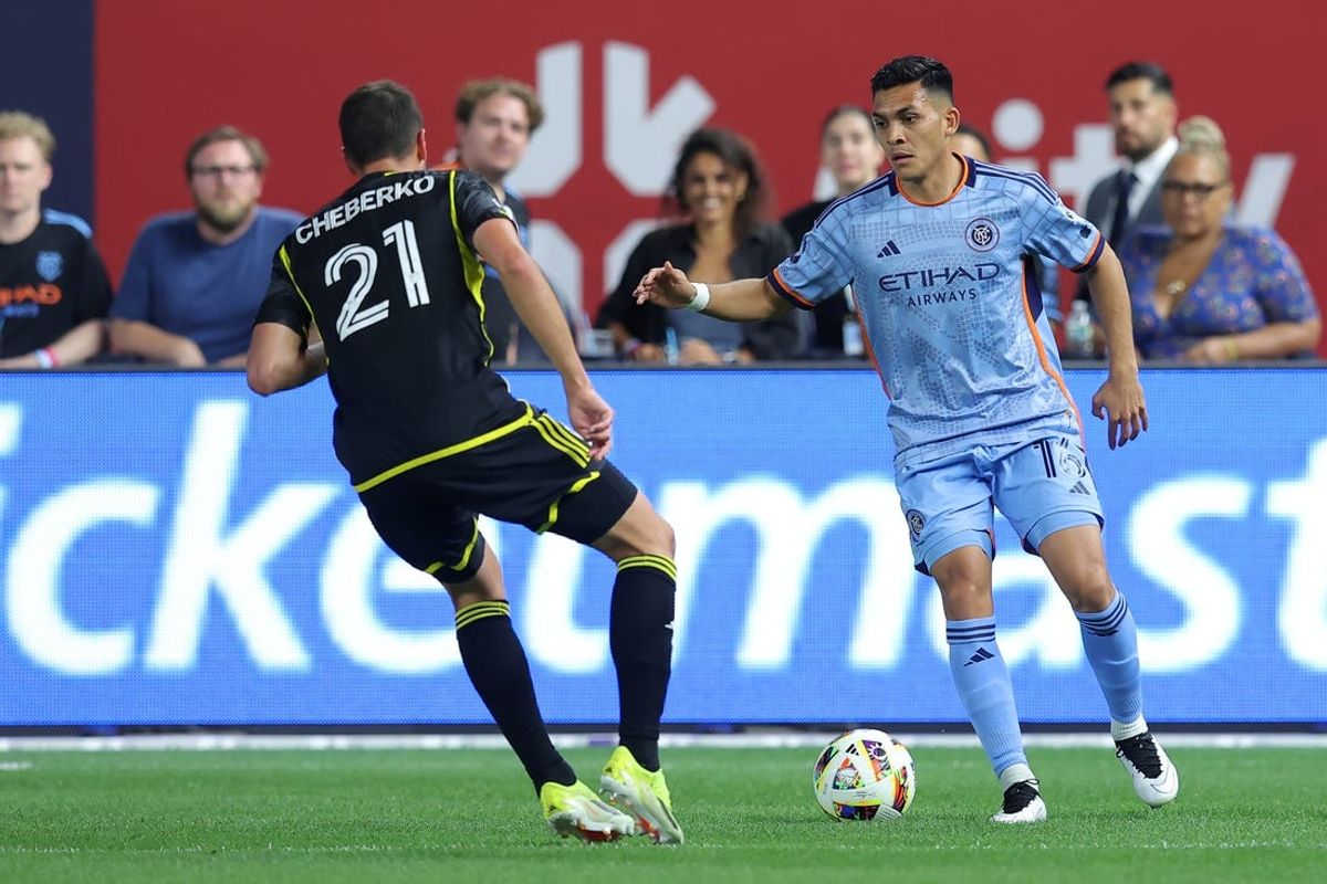 Jun 14, 2024; Bronx, New York, USA; New York City FC forward Alonso Martinez (16) looks to pass the ball against Columbus Crew defender Yevhen Cheberko (21) during the first half at Yankee Stadium. Mandatory Credit: Brad Penner-USA TODAY Sports