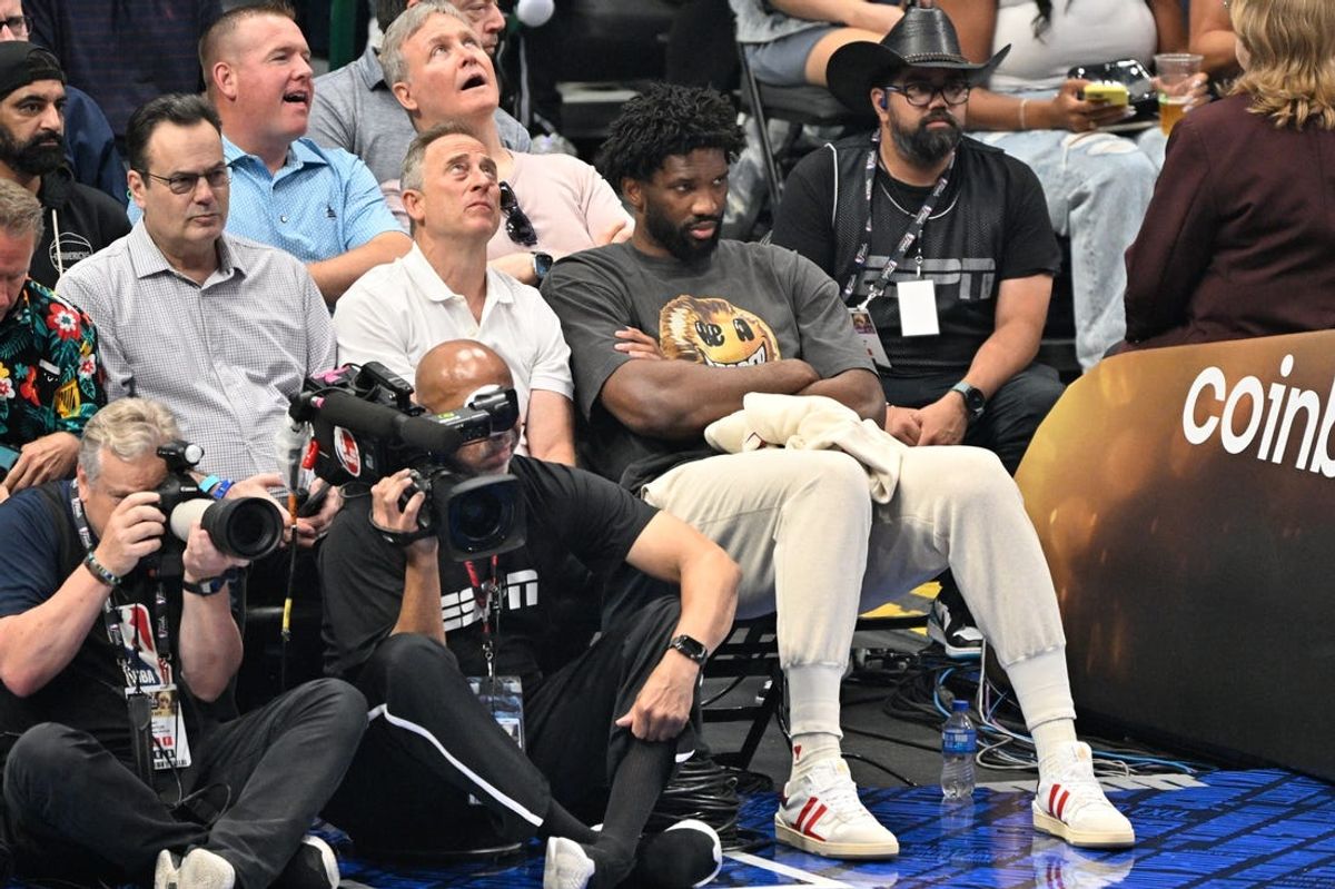 Jun 14, 2024; Dallas, Texas, USA; Philadelphia 76ers center Joel Embiid (21) watch the first quarter between the Boston Celtics and the Dallas Mavericks during game four of the 2024 NBA Finals at American Airlines Center. Mandatory Credit: Jerome Miron-USA TODAY Sports