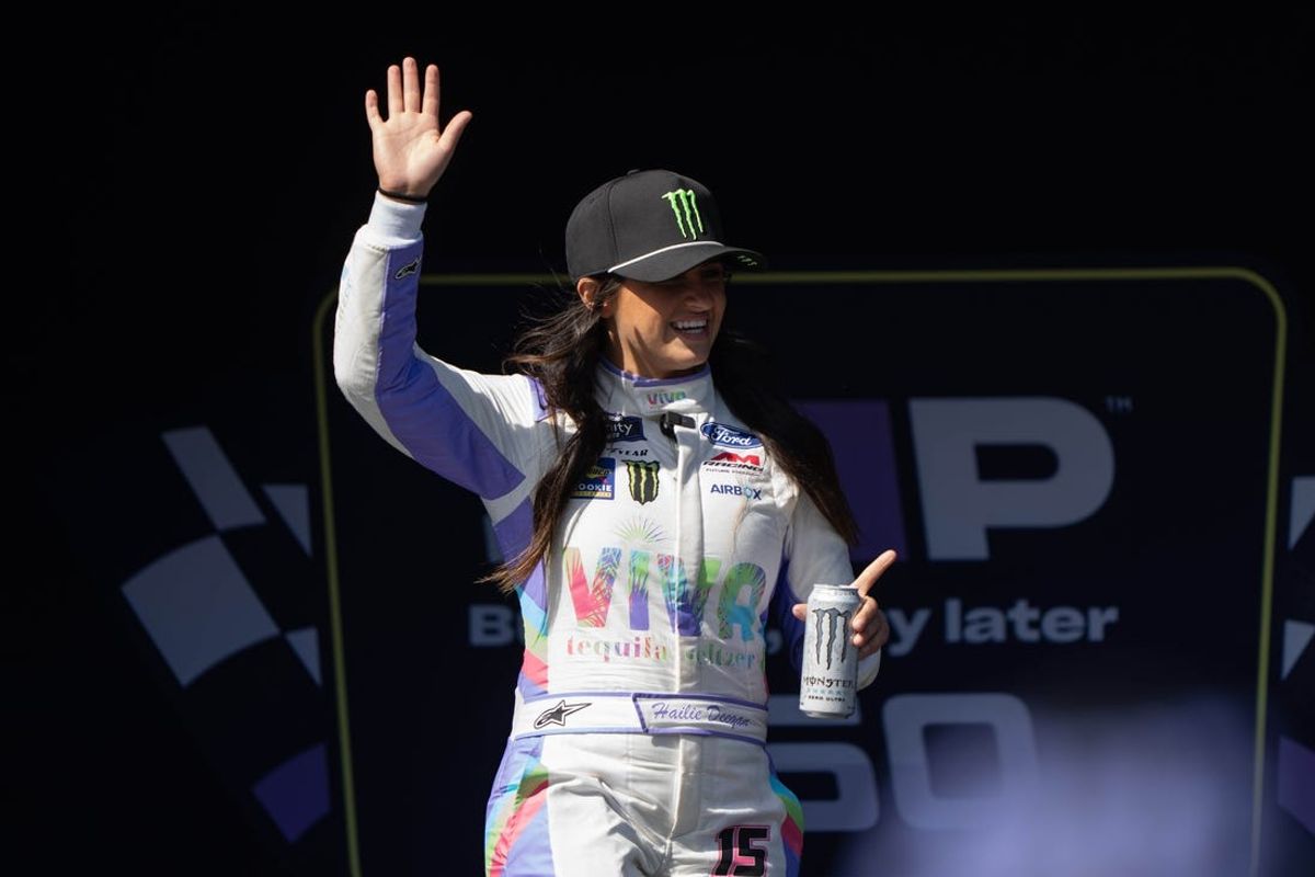 Jun 8, 2024; Sonoma, California, USA;  NASCAR Xfinity Series driver Hailie Deegan (15) waves at fans during the driver’s introductions before the start of the NASCAR Xfinity Sonoma 250 at Sonoma Raceway. Mandatory Credit: Stan Szeto-USA TODAY Sports
