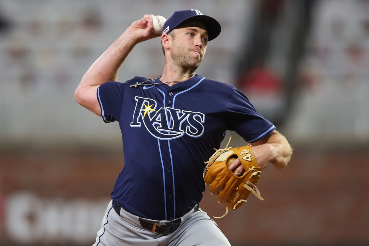 Jun 14, 2024; Atlanta, Georgia, USA; Tampa Bay Rays relief pitcher Jason Adam (47) throws against the Atlanta Braves in the eighth inning at Truist Park. Mandatory Credit: Brett Davis-USA TODAY Sports