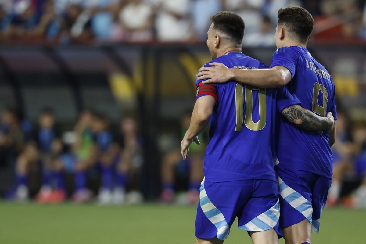 Jun 14, 2024; Landover, Maryland, USA; Argentina midfielder Lionel Messi (10) celebrates with Argentina midfielder forward Julian Alvarez (9) after scoring a goal against Guatemala in the second half at Commanders Field. Mandatory Credit: Geoff Burke-USA TODAY Sports