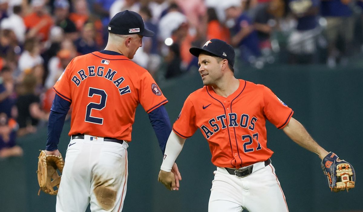 Jun 14, 2024; Houston, Texas, USA;  Houston Astros third baseman Alex Bregman (2) and second baseman Jose Altuve (27) celebrate the win against the Detroit Tigers at Minute Maid Park. Mandatory Credit: Thomas Shea-Imagn Images