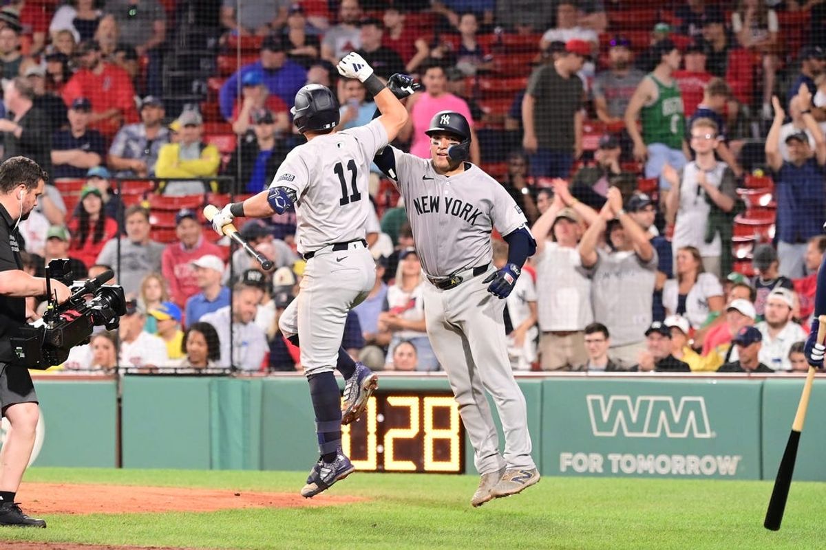 Jun 14, 2024; Boston, Massachusetts, USA; New York Yankees catcher Jose Trevino (39) celebrates a home run against the Boston Red Sox with shortstop Anthony Volpe (11)  during the ninth inning at Fenway Park. Mandatory Credit: Eric Canha-USA TODAY Sports
