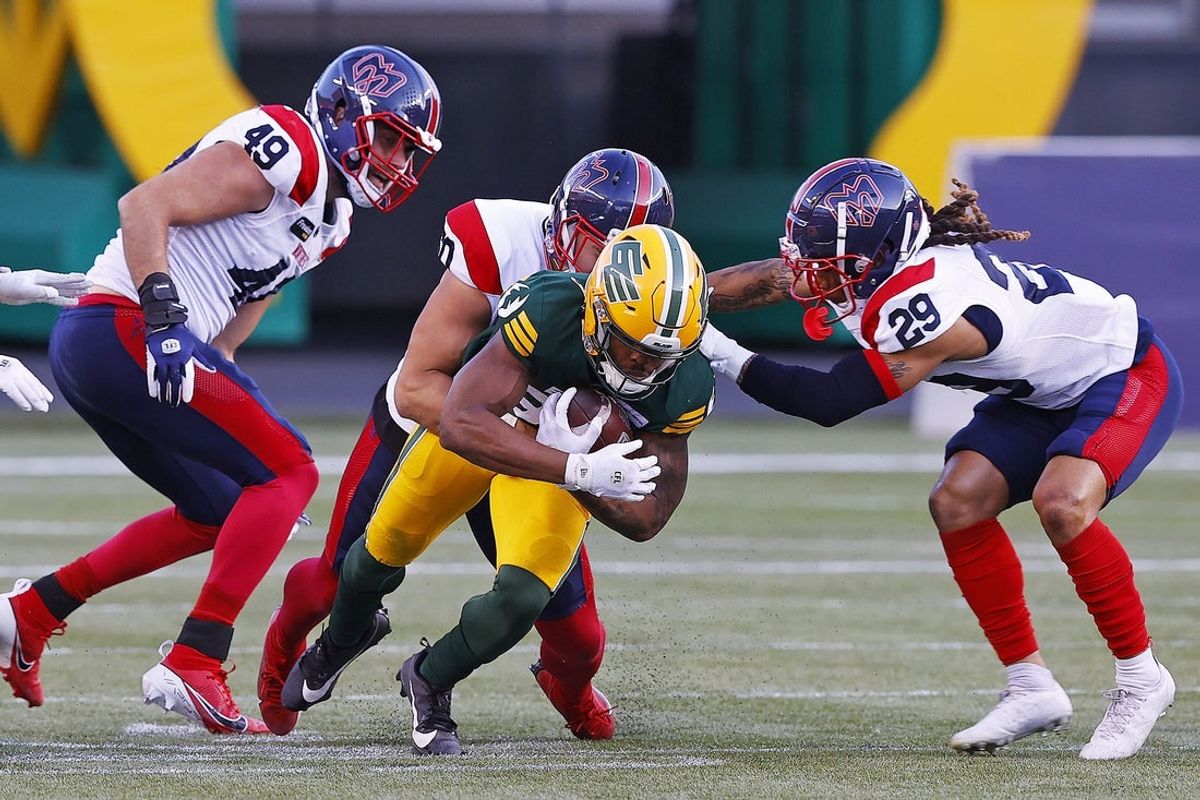 Jun 14, 2024; Edmonton, Alberta, CAN; Edmonton Elks wide receiver Malik Flowers (88) catches the ball in front of Montreal Alouettes cornerback Cre'Von LeBlanc (29) and Montreal Alouettes at Commonwealth Stadium. Mandatory Credit: Perry Nelson-Imagn Images