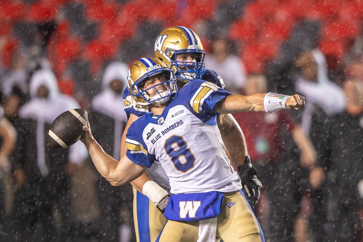 Jun 13, 2024; Ottawa, Ontario, CAN;  Winnipeg Blue Bombers quarterback Zach Collaros (8) makes one last throw at the end of the second half against the Ottawa REDBLACKS at TD Place. Mandatory Credit: Marc DesRosiers-USA TODAY Sports