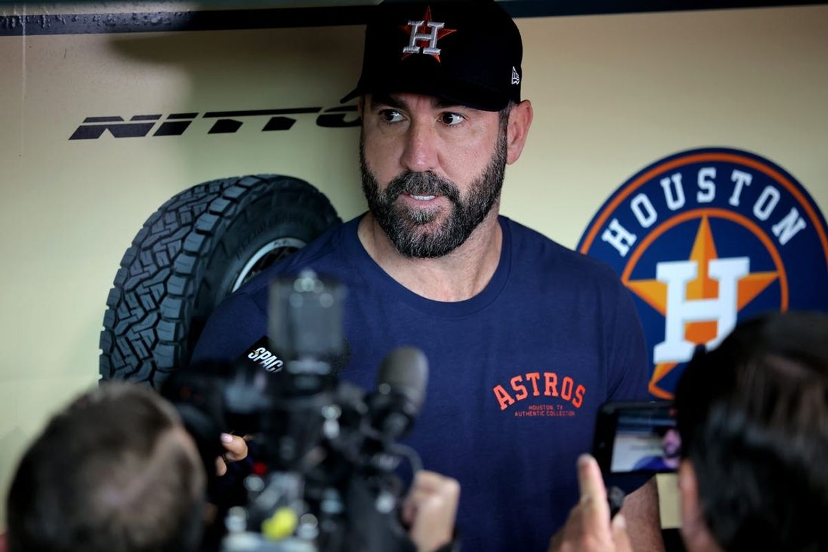 Jun 15, 2024; Houston, Texas, USA; Houston Astros starting pitcher Justin Verlander (35) talks to the media in the dugout prior to the game against the Detroit Tigers at Minute Maid Park. Mandatory Credit: Erik Williams-USA TODAY Sports