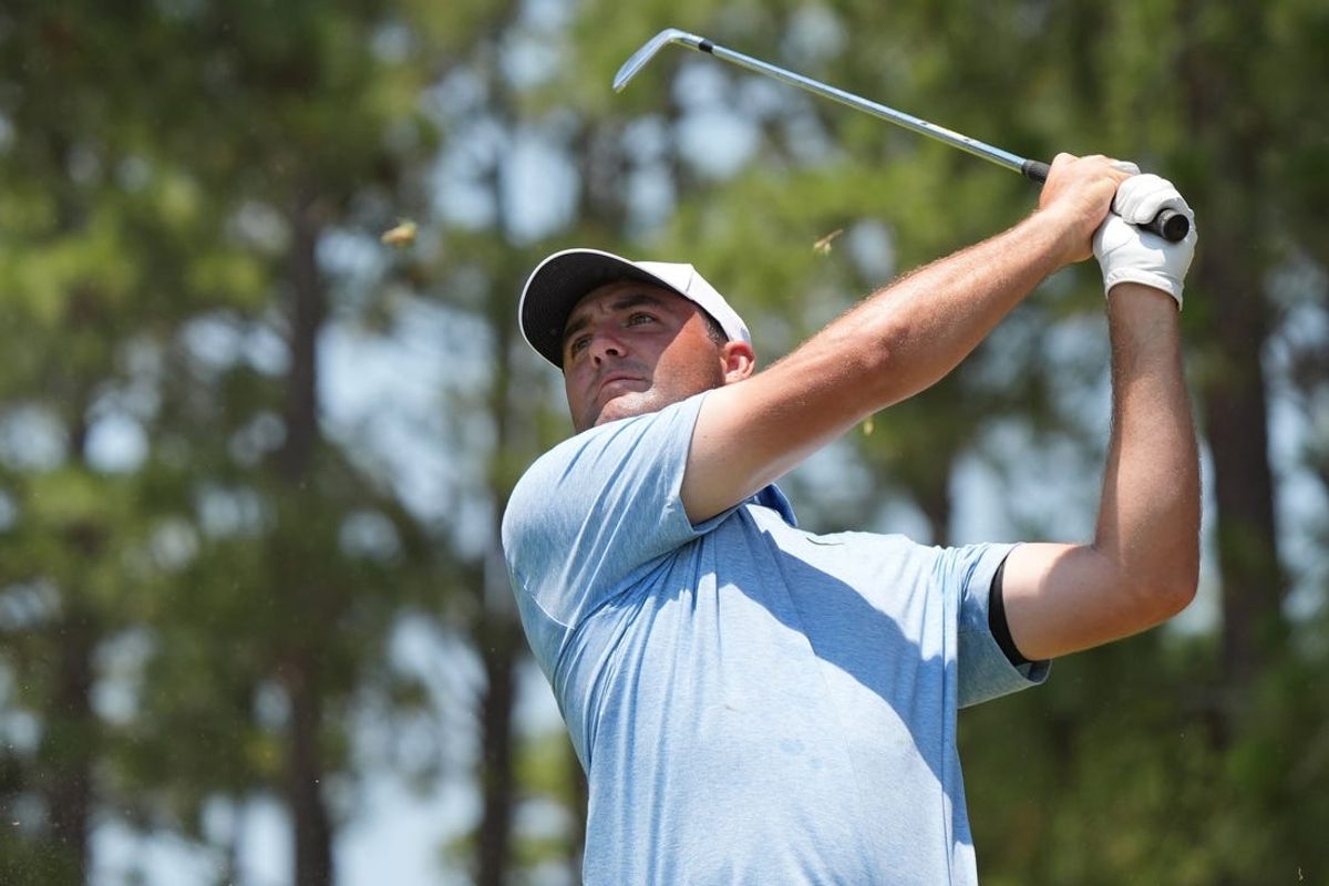 Jun 15, 2024; Pinehurst, North Carolina, USA; Scottie Scheffler tees off on the 17th hole during the third round of the U.S. Open golf tournament. Mandatory Credit: Katie Goodale-USA TODAY Sports