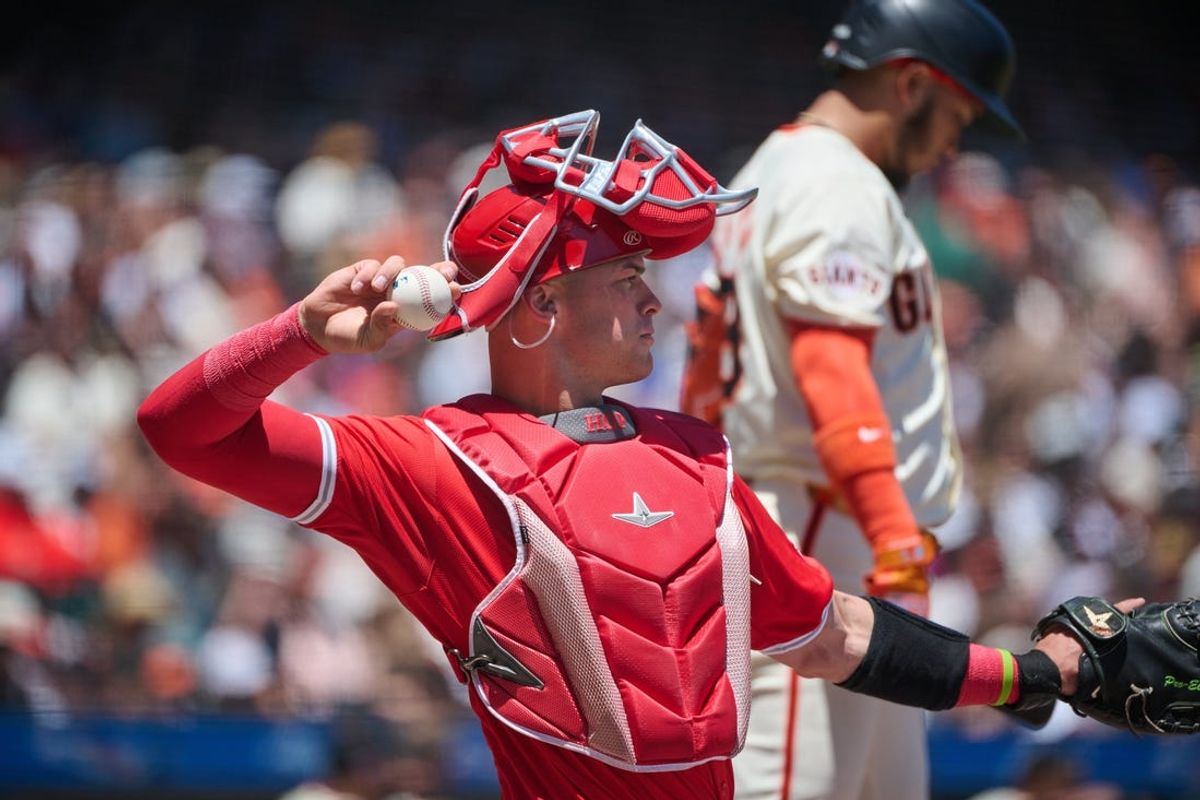 Jun 15, 2024; San Francisco, California, USA; Los Angeles Angels catcher Logan O'Hoppe (14) throws the ball back to the pitcher against the San Francisco Giants during the first inning at Oracle Park. Mandatory Credit: Robert Edwards-USA TODAY Sports