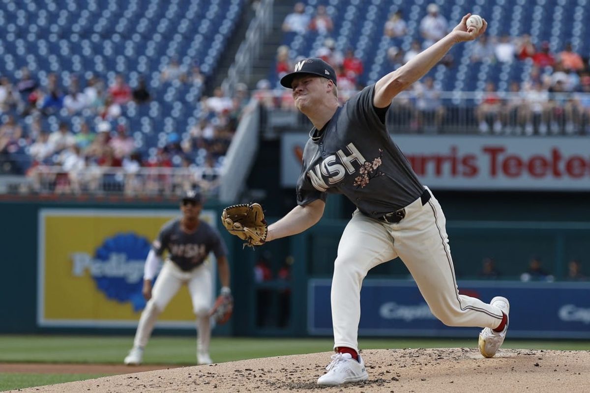 Jun 15, 2024; Washington, District of Columbia, USA; Washington Nationals starting pitcher DJ Herz (74) pitches against the Miami Marlins during the second inning at Nationals Park. Mandatory Credit: Geoff Burke-USA TODAY Sports