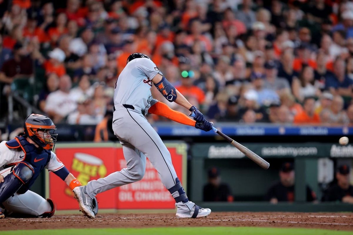 Jun 15, 2024; Houston, Texas, USA;Detroit Tigers center fielder Riley Greene (31) hits an RBI single to center field against the Houston Astros during the third inning at Minute Maid Park. Mandatory Credit: Erik Williams-USA TODAY Sports