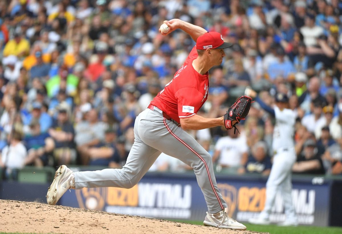 Jun 15, 2024; Milwaukee, Wisconsin, USA; Cincinnati Reds relief pitcher Brent Suter (31) delivers a pitch against the Milwaukee Brewers in the eighth inning at American Family Field. Mandatory Credit: Michael McLoone-USA TODAY Sports