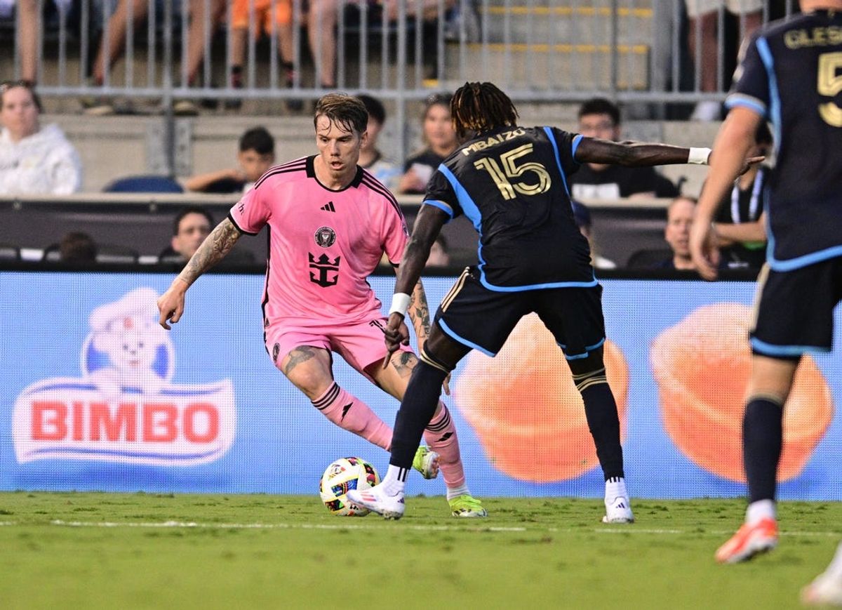 Jun 15, 2024; Philadelphia, PA, USA; Inter Miami midfielder Robert Taylor (16) is defended by Philadelphia Union defender Olivier Mbaizo (15) in a MLS game at Subaru Park. Mandatory Credit: Caean Couto-USA TODAY Sports