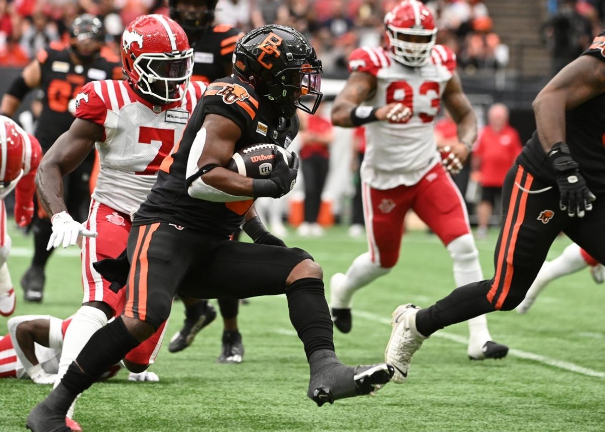 Jun 15, 2024; Vancouver, British Columbia, CAN;  BC Lions running back William Stanback (31) runs with the ball during the first half against the Calgary Stampeders at BC Place. Mandatory Credit: Simon Fearn-Imagn Images