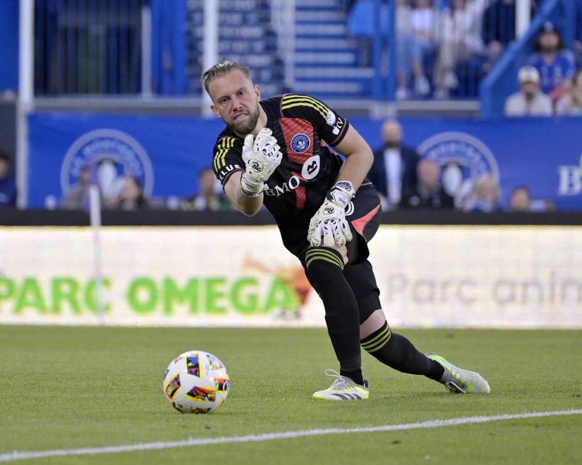 Jun 15, 2024; Montreal, Quebec, CAN; CF Montreal goalkeeper Jonathan Sirois (40) plays the ball against the Real Salt Lake during the first half at Stade Saputo. Mandatory Credit: Eric Bolte-USA TODAY Sports