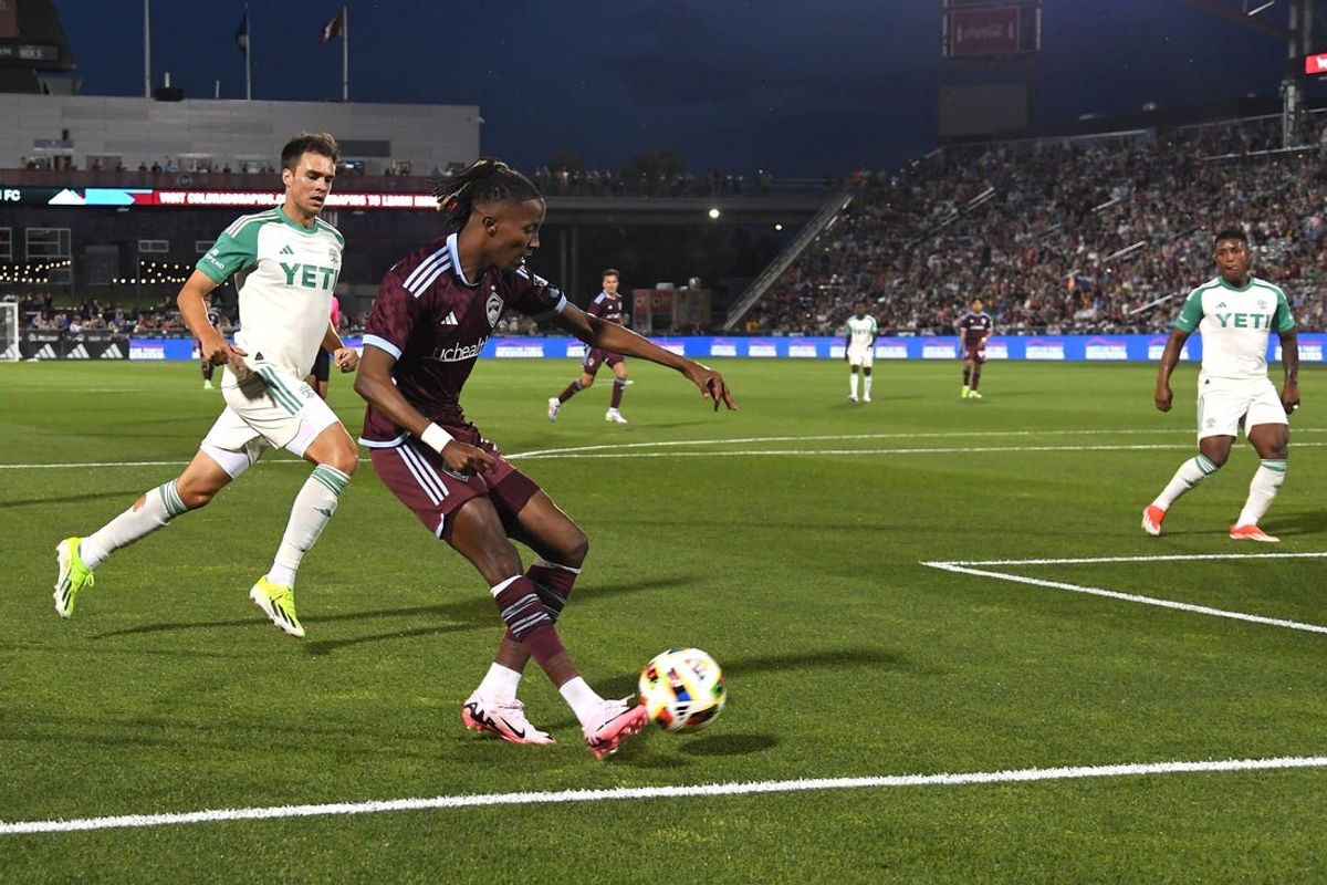 Jun 15, 2024; Commerce City, Colorado, USA; Colorado Rapids forward Kevin Cabral (91) crosses the ball against Austin FC during the second half at Dick's Sporting Goods Park. Mandatory Credit: Christopher Hanewinckel-USA TODAY Sports