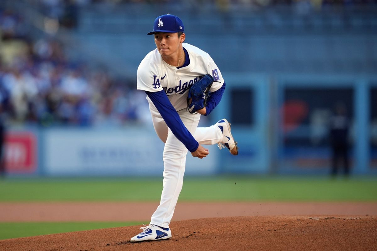Jun 15, 2024; Los Angeles, California, USA; Los Angeles Dodgers starting pitcher Yoshinobu Yamamoto (18) throws in the first inning against the Kansas City Royals at Dodger Stadium. Mandatory Credit: Kirby Lee-Imagn Images
