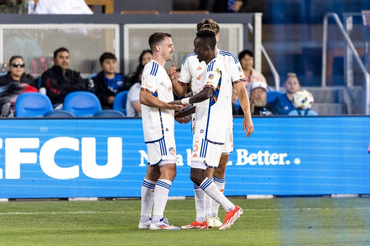 Jun 15, 2024; San Jose, California, USA; FC Cincinnati midfielder Pavel Bucha (20) is congratulated by teammates after scoring a goal during the second half against the San Jose Earthquakes at PayPal Park. Mandatory Credit: John Hefti-USA TODAY Sports