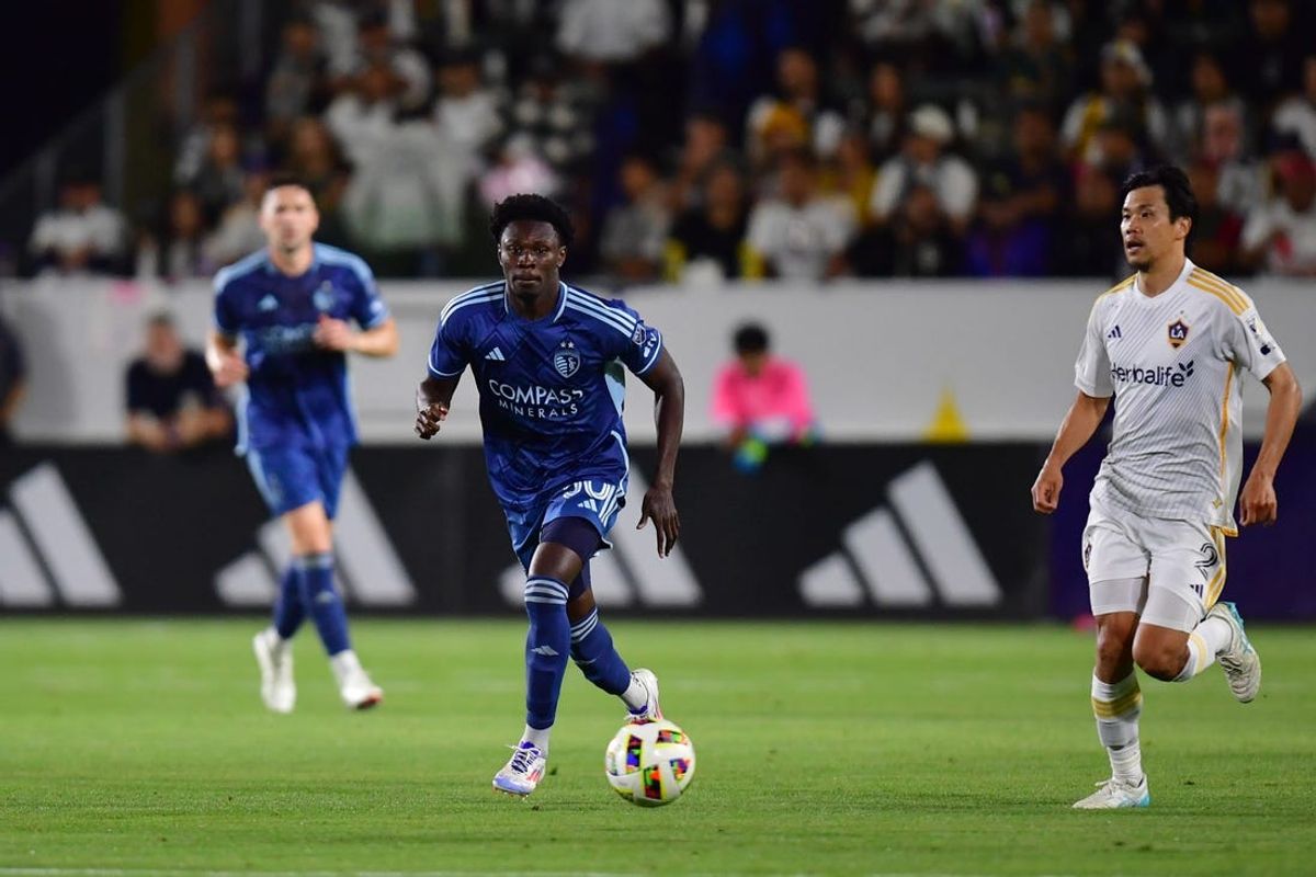 Jun 15, 2024; Carson, California, USA; Sporting Kansas City forward Stephen Afrifa (30) controls the ball in the second half against the LA Galaxy at Dignity Health Sports Park. Mandatory Credit: Gary A. Vasquez-USA TODAY Sports