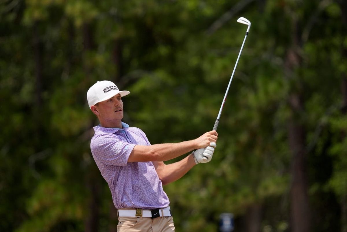 Jun 16, 2024; Pinehurst, North Carolina, USA; Luke Clanton hits from the native area on the second fairway during the final round of the U.S. Open golf tournament. Mandatory Credit: Katie Goodale-USA TODAY Sports