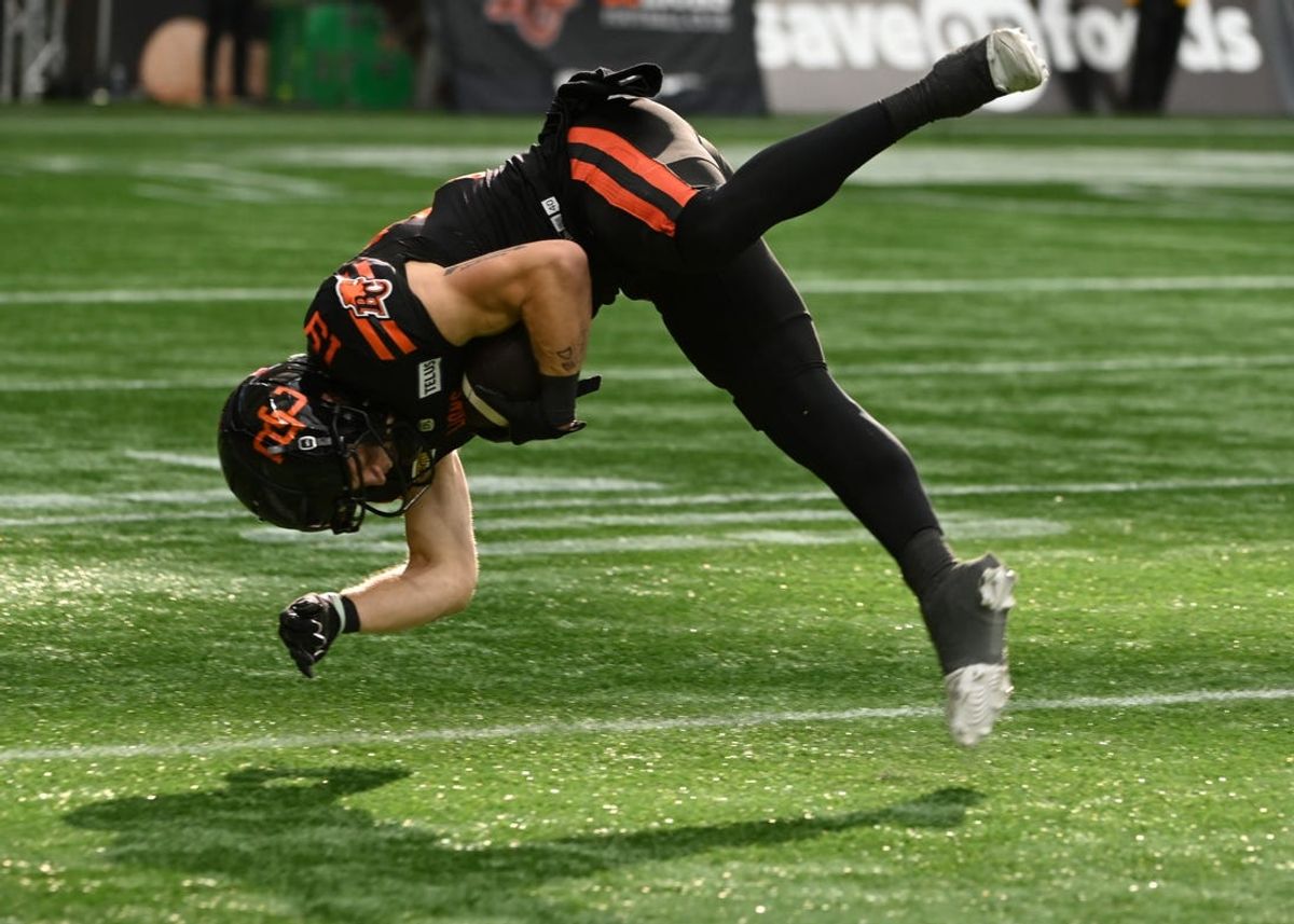 Jun 15, 2024; Vancouver, British Columbia, CAN;  BC Lions wide receiver Justin McInnis (18) makes a catch against the Calgary Stampeders during the second half at BC Place. Mandatory Credit: Simon Fearn-USA TODAY Sports