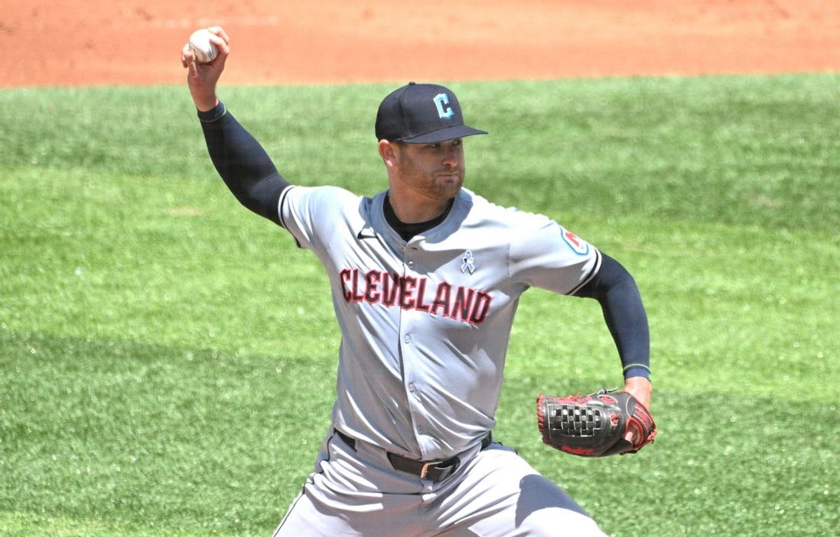 Jun 16, 2024; Toronto, Ontario, CAN;  Cleveland Guardians starting pitcher Ben Lively (39) delivers a pitch against the Toronto Blue Jays in the first inning at Rogers Centre. Mandatory Credit: Dan Hamilton-USA TODAY Sports
