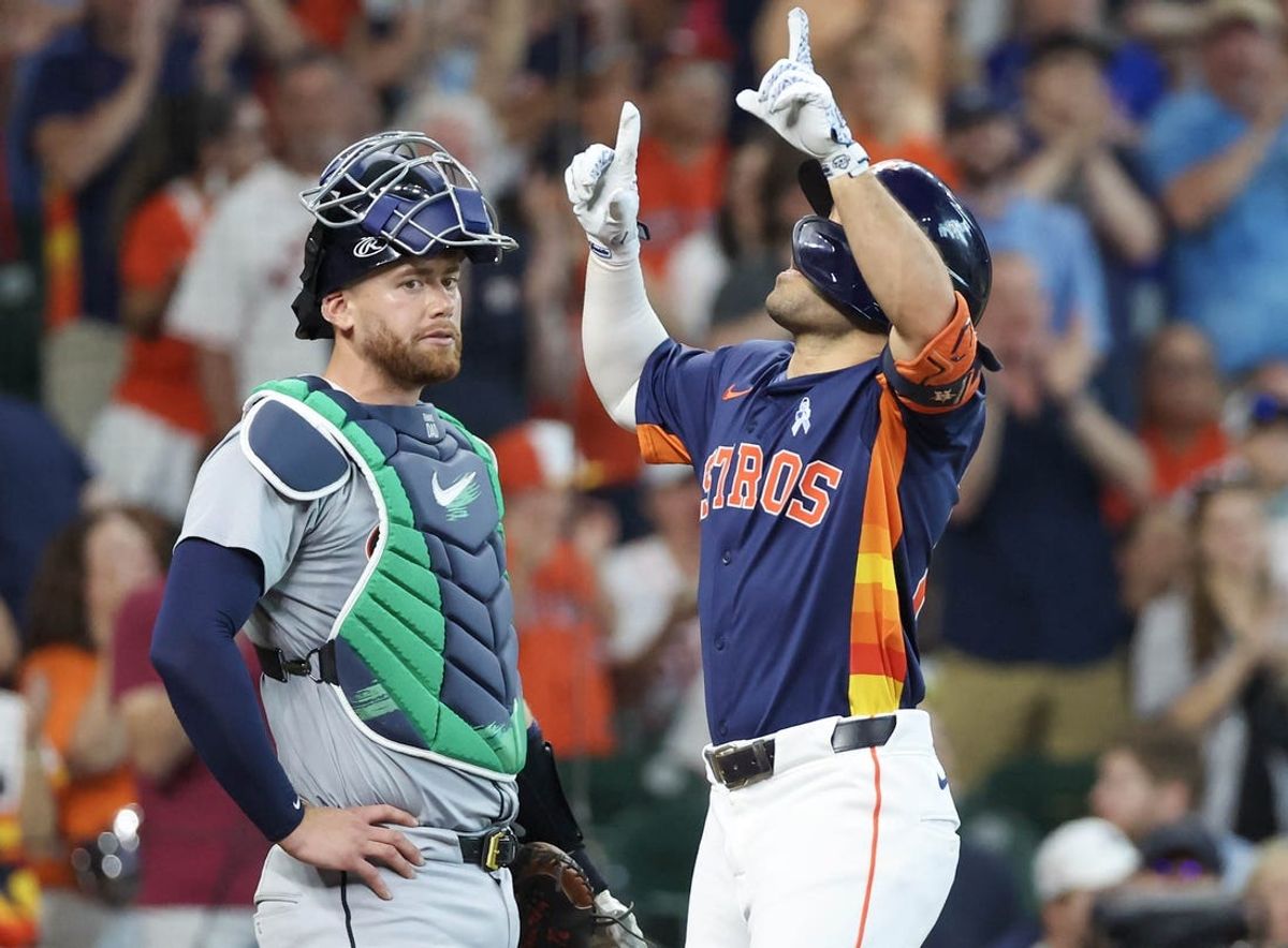 Jun 16, 2024; Houston, Texas, USA; Houston Astros second baseman Jose Altuve (27) celebrates his three run home run in front of Detroit Tigers catcher Carson Kelly (15) in the second inning at Minute Maid Park. Mandatory Credit: Thomas Shea-USA TODAY Sports