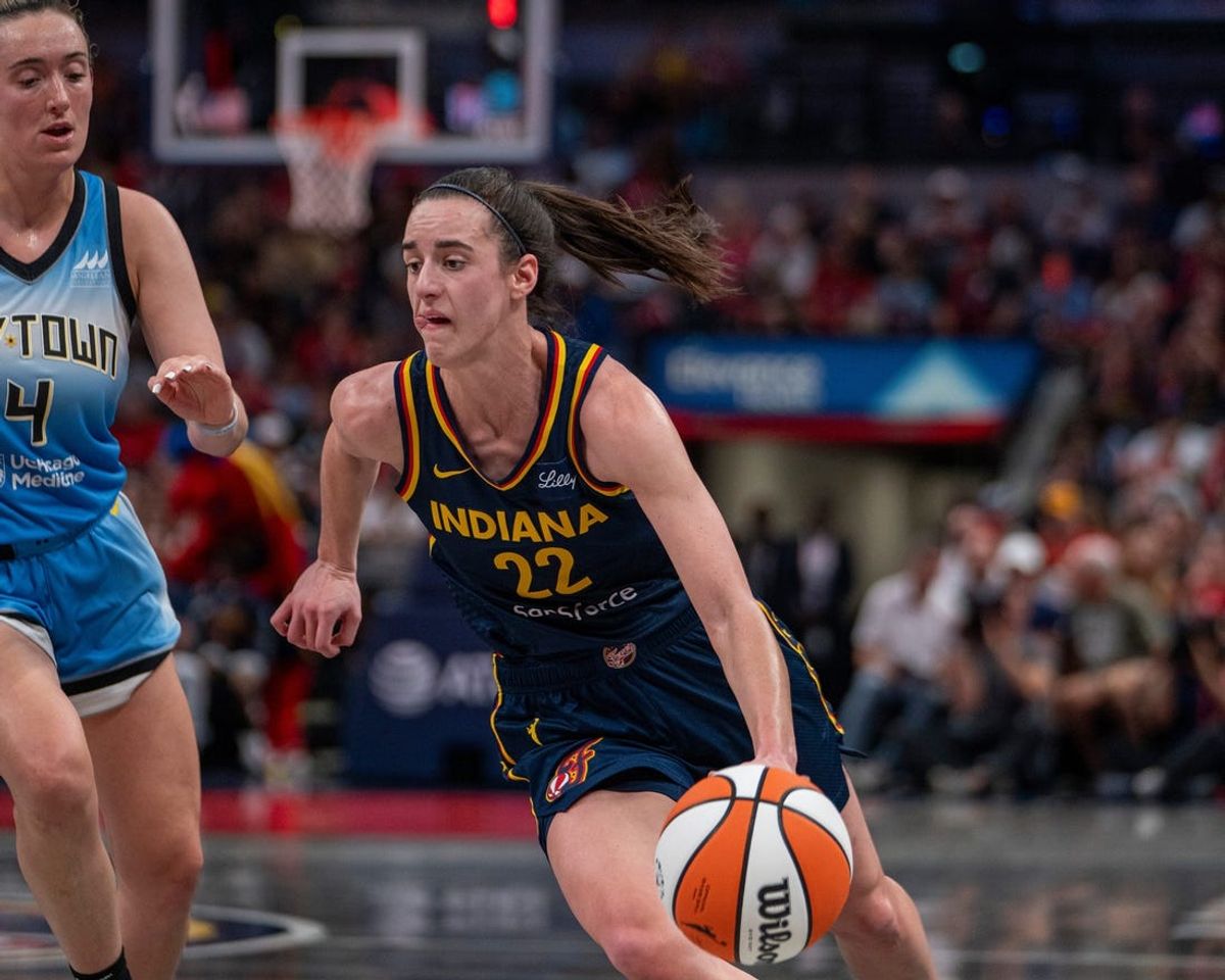 Indiana Fever guard Caitlin Clark (22) dribbles around Chicago Sky guard Marina Mabrey (4) on Sunday June 16, 2024, during the game at Gainbridge Fieldhouse in Indianapolis. The Fever beat the Sky 91-83.