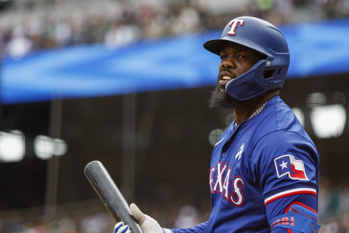 Jun 16, 2024; Seattle, Washington, USA; Texas Rangers right fielder Adolis Garcia (53) stands in the on-deck circle  during the first inning against the Seattle Mariners at T-Mobile Park. Mandatory Credit: Joe Nicholson-USA TODAY Sports