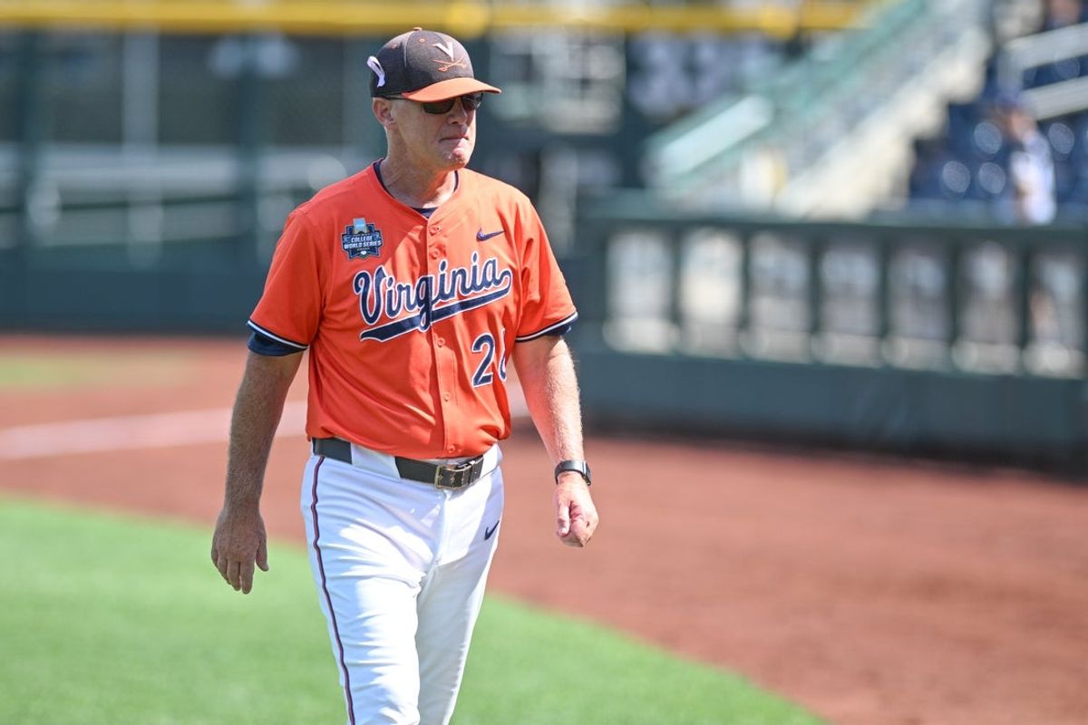 Jun 16, 2024; Omaha, NE, USA;  Virginia Cavalier head coach Brian O'Connor walks off the field after the loss against the Florida State Seminoles at Charles Schwab Field Omaha. Mandatory Credit: Steven Branscombe-Imagn Images