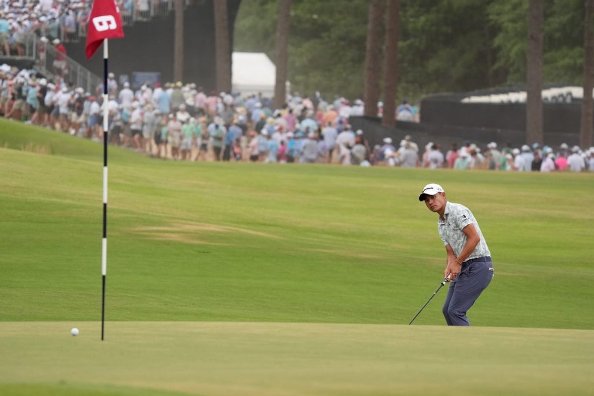 Jun 16, 2024; Pinehurst, North Carolina, USA; Collin Morikawa putts on the sixth green during the final round of the U.S. Open golf tournament. Mandatory Credit: Katie Goodale-USA TODAY Sports