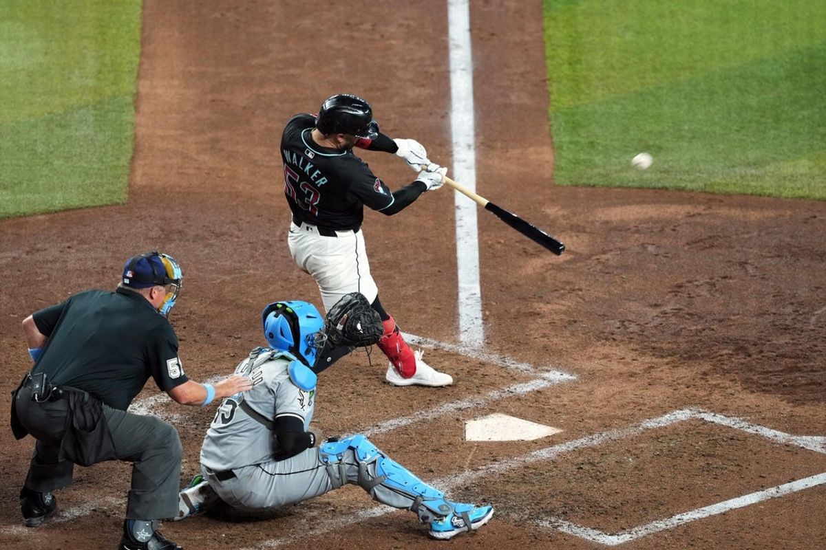 Jun 16, 2024; Phoenix, Arizona, USA; Arizona Diamondbacks first base Christian Walker (53) hits against the Chicago White Sox at Chase Field. Mandatory Credit: Joe Camporeale-USA TODAY Sports