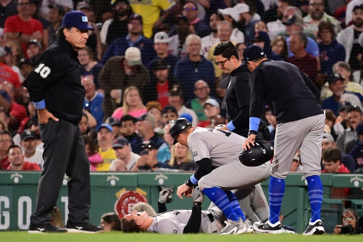 Jun 16, 2024; Boston, Massachusetts, USA; New York Yankees first baseman Anthony Rizzo (48) is checked by medical staff during the seventh inning at Fenway Park. Mandatory Credit: Eric Canha-USA TODAY Sports