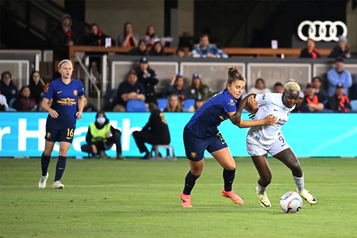 Jun 16, 2024; San Jose, California, USA; Bay FC forward Racheal Kundananji (9) plays the ball defended by Utah Royals FC defender Ana Tejeda (17) in the second half at PayPal Park. Mandatory Credit: Robert Edwards-USA TODAY Sports