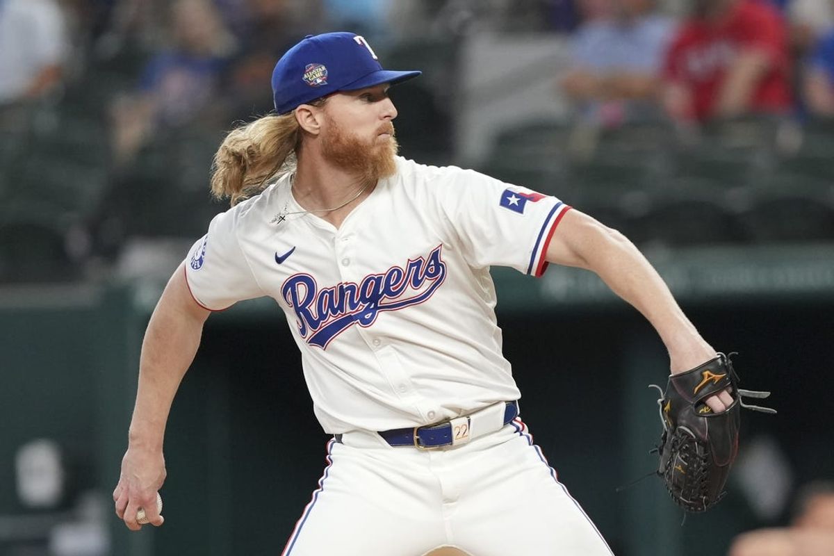 Jun 17, 2024; Arlington, Texas, USA; Texas Rangers starting pitcher Jon Gray (22) delivers a pitch to the New York Mets during the first inning at Globe Life Field. Mandatory Credit: Jim Cowsert-USA TODAY Sports